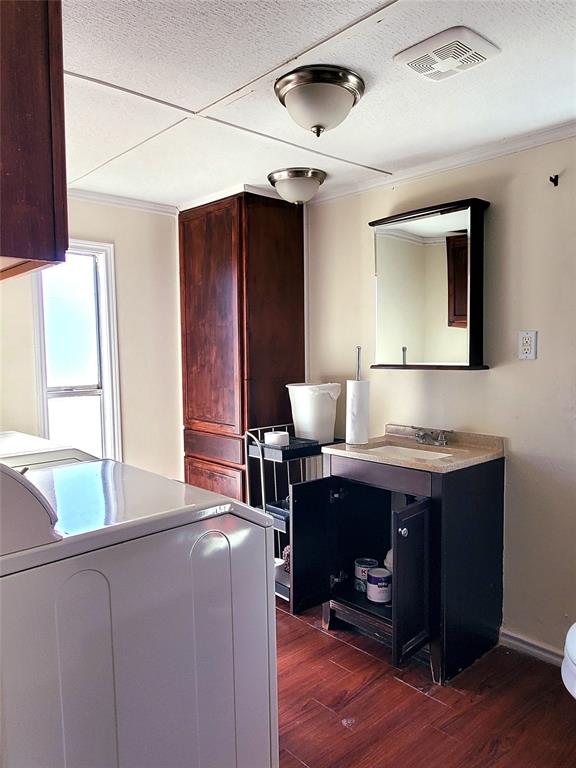 103 Hackberry Lane Roanoke, TX 76262 - Photo 8 of 9 a room with a chair and a fireplace