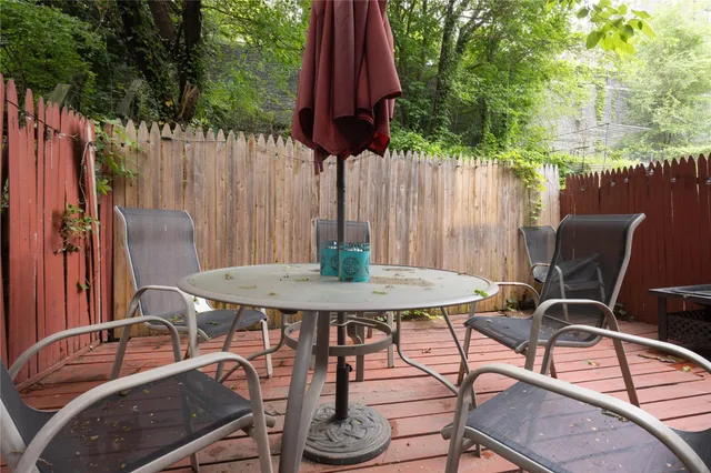 a view of a table and chairs in patio
