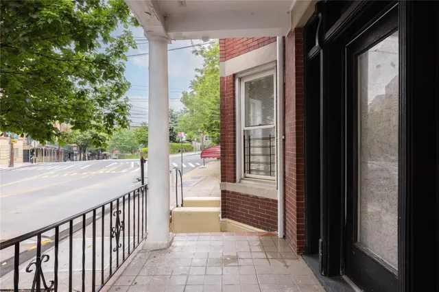 a view of a house with a porch