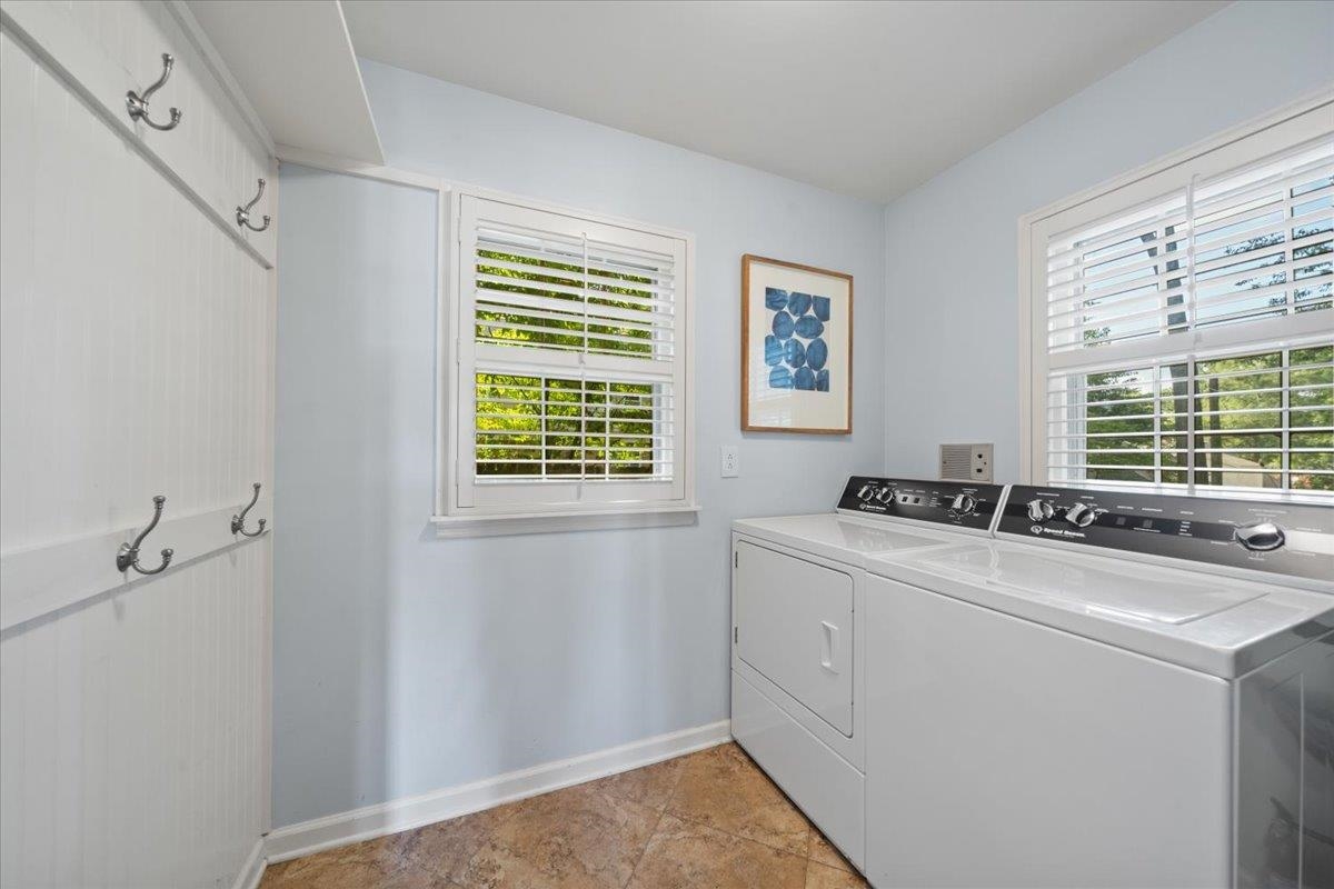 5376 Mason Road Memphis, TN 38120 - Photo 20 of 37 Laundry area with washing machine and clothes dryer and light tile patterned floors