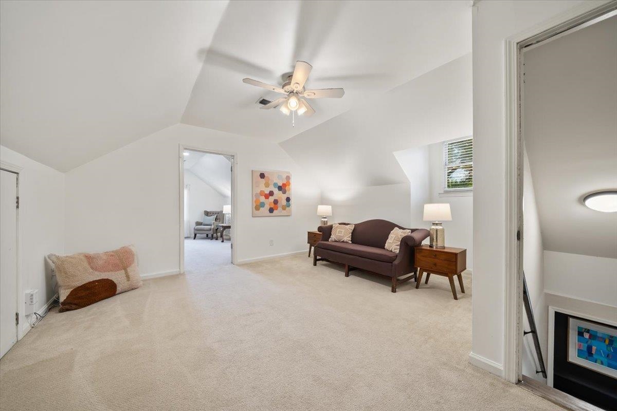 5376 Mason Road Memphis, TN 38120 - Photo 29 of 37 Sitting room with lofted ceiling, carpet floors, and ceiling fan