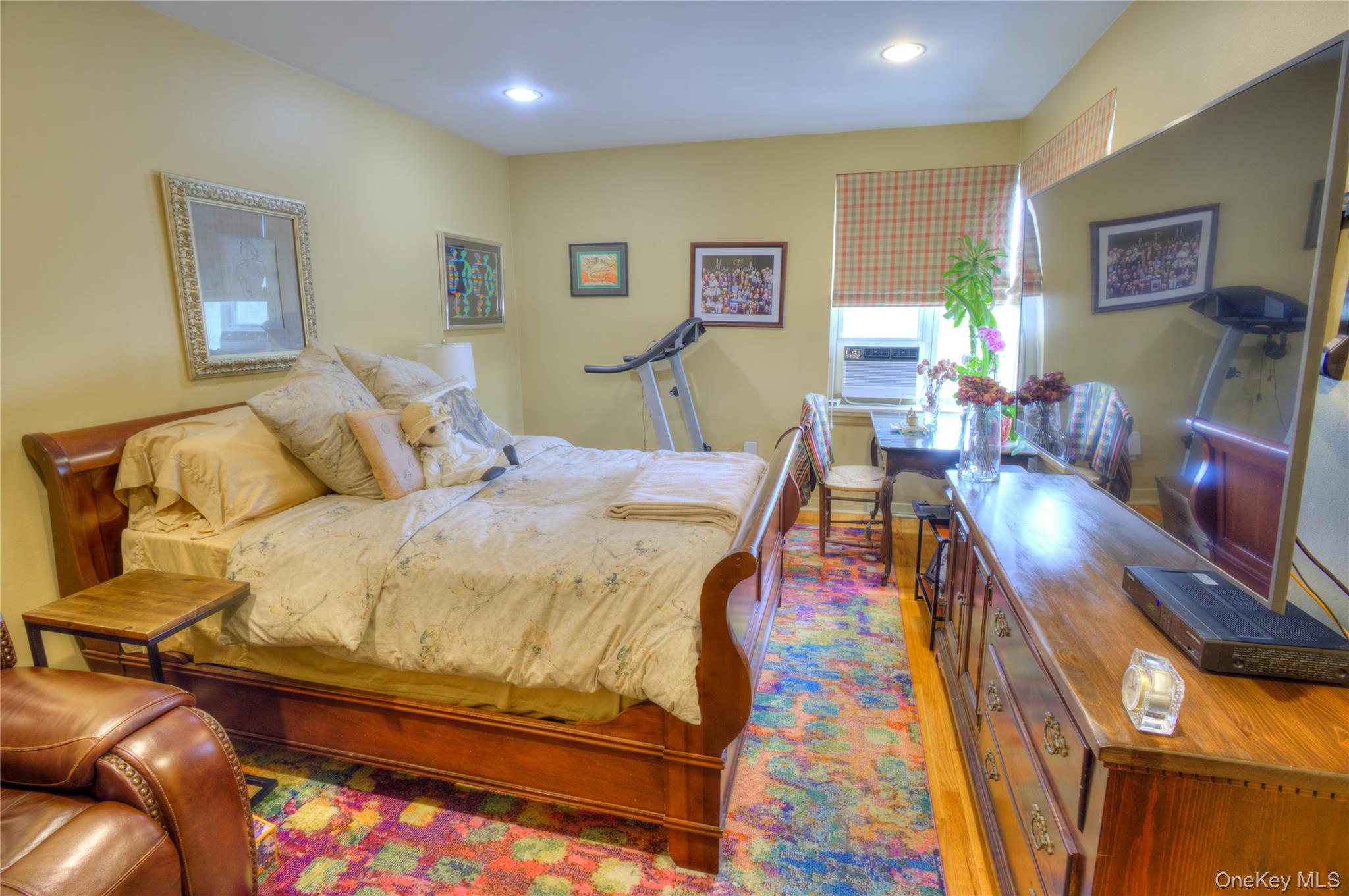 75 South Middle Neck Road, Unit 4G Great Neck, NY 11021 - Photo 19 of 37 a bed room with a bed and furniture