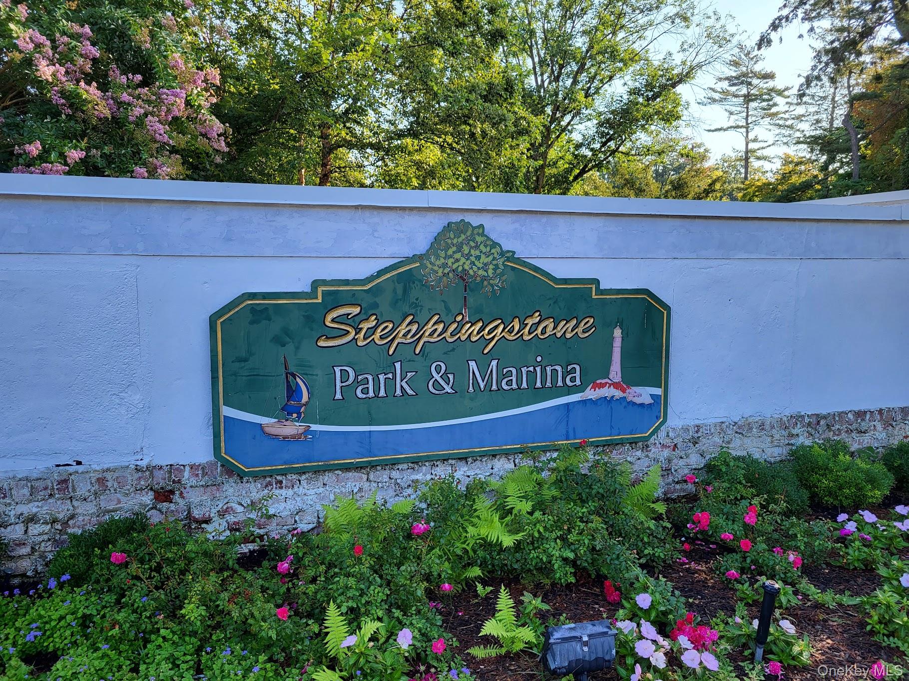 75 South Middle Neck Road, Unit 4G Great Neck, NY 11021 - Photo 31 of 37 a sign that is sitting in front of flowers