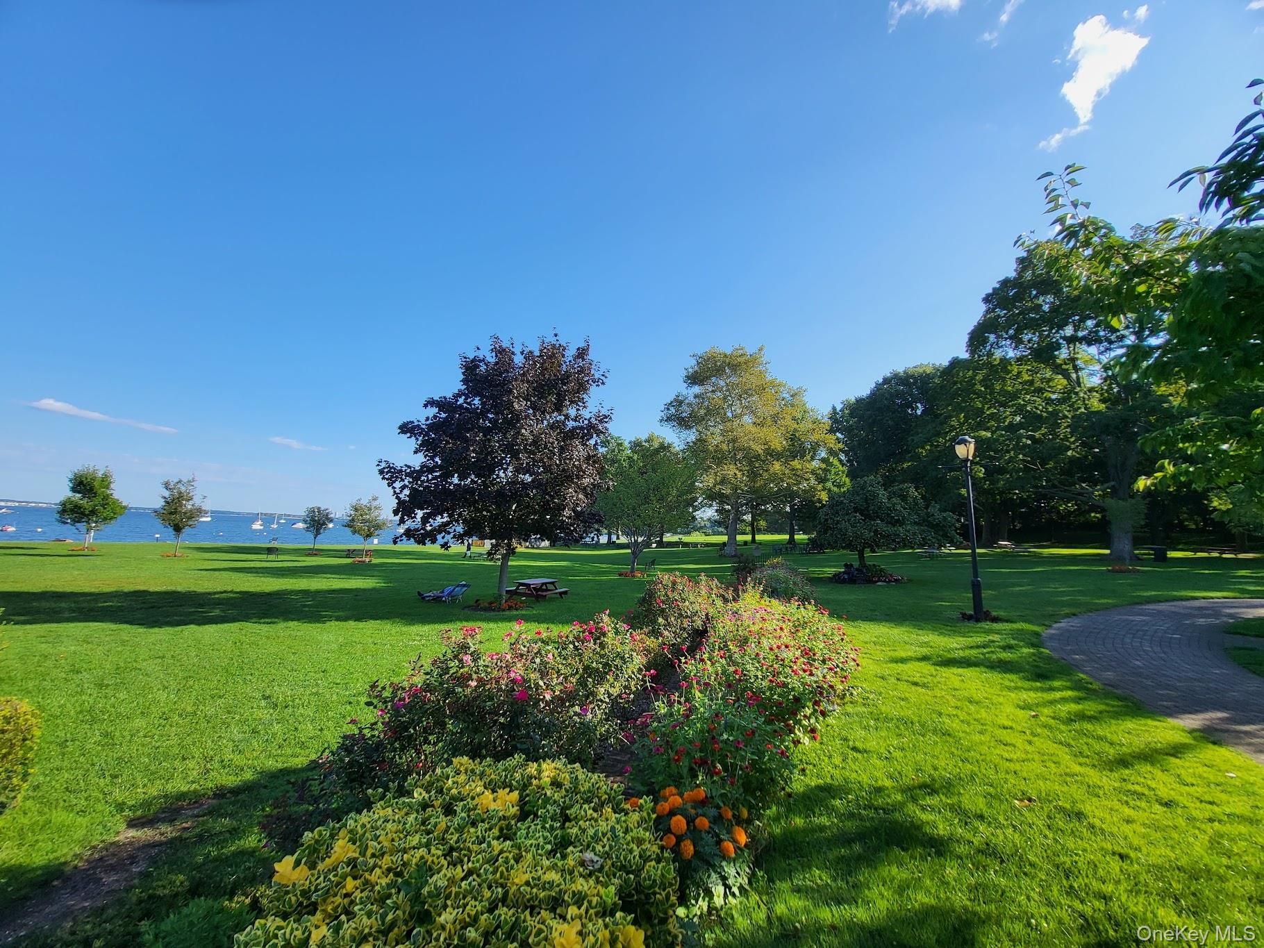 75 South Middle Neck Road, Unit 4G Great Neck, NY 11021 - Photo 34 of 37 a view of a park with a lake view
