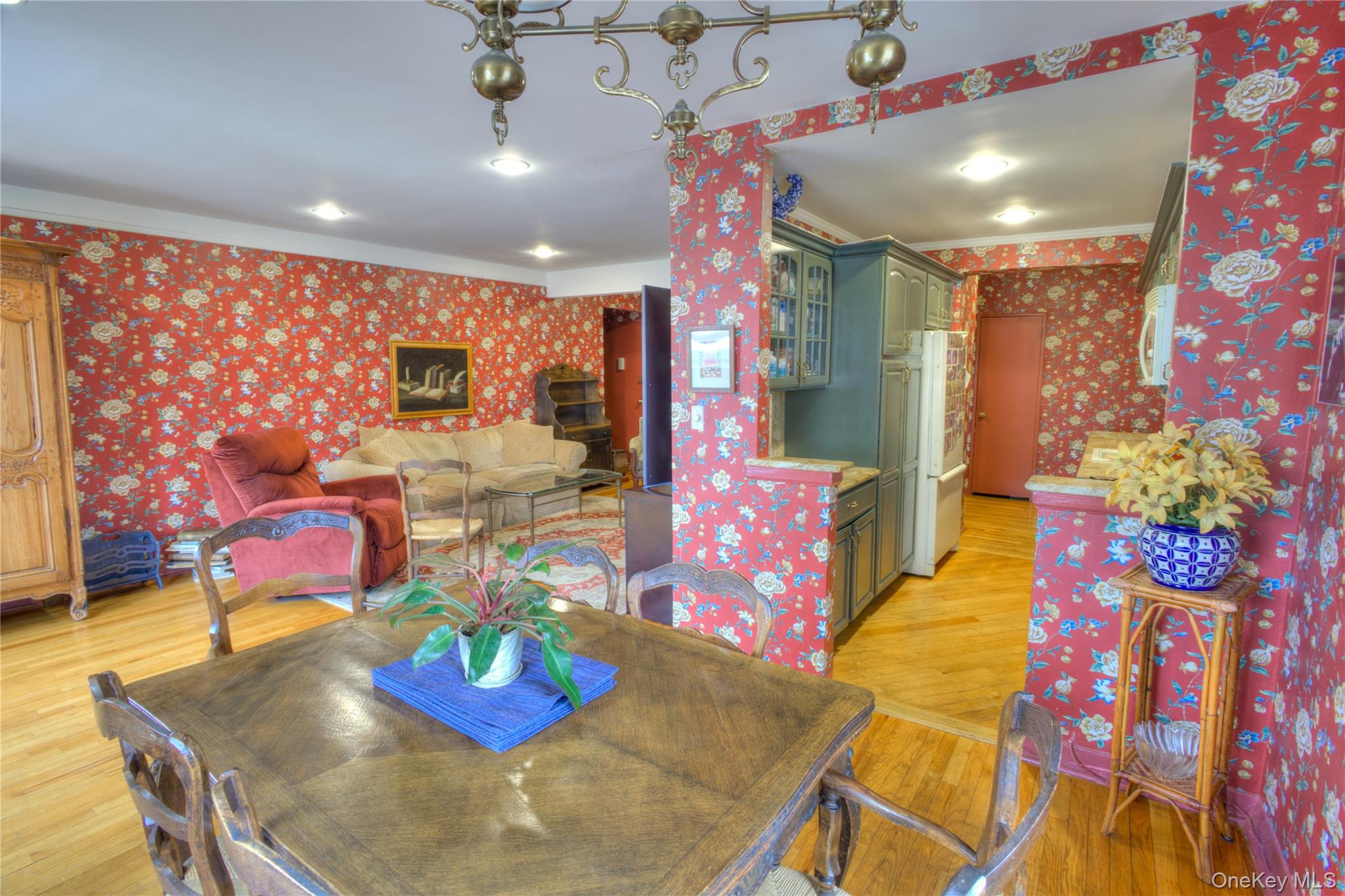 75 South Middle Neck Road, Unit 4G Great Neck, NY 11021 - Photo 10 of 37 a living room with furniture and wooden floor