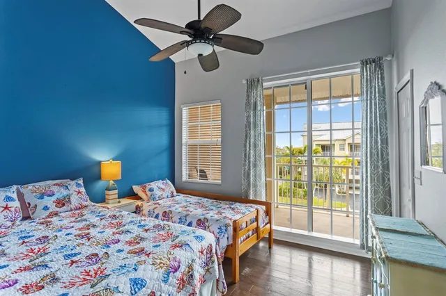 a outdoor space with lots of tables a chairs and a barbeque