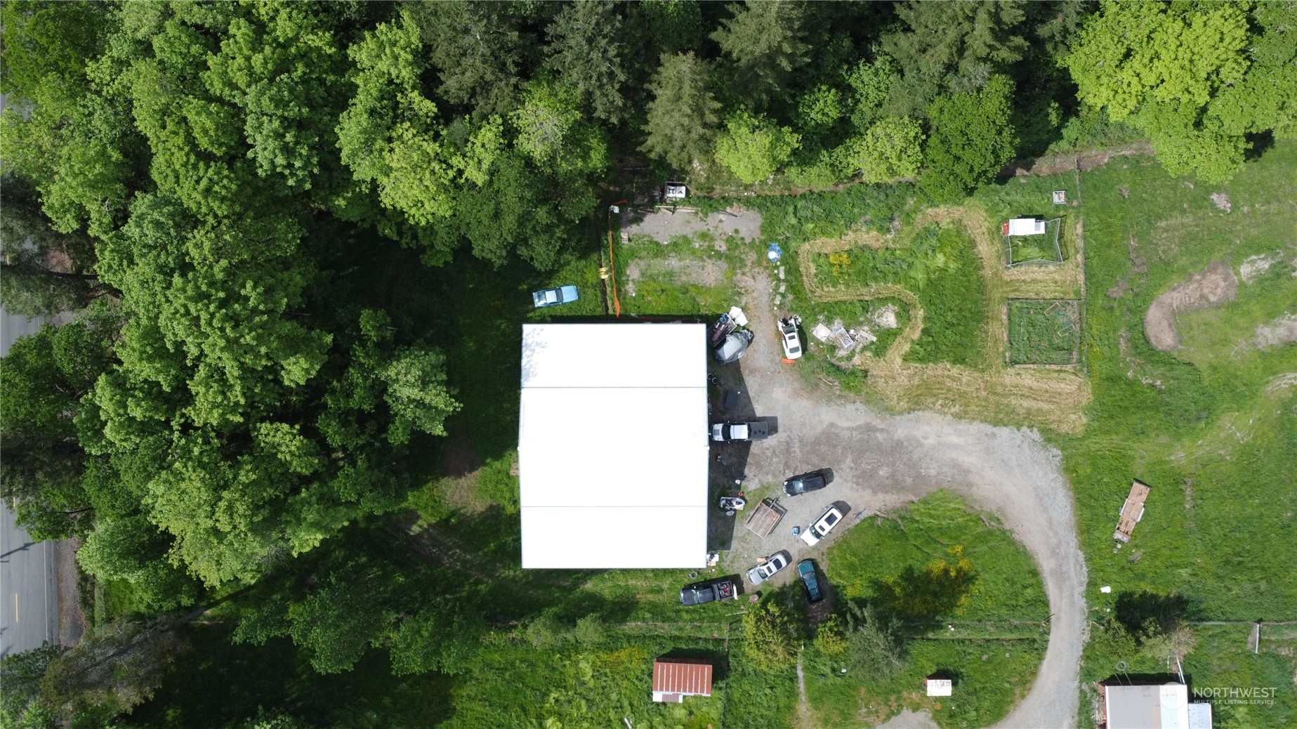 326 Henriot Road Winlock, WA 98596 - Photo 8 of 20 an aerial view of a house with a yard and garden