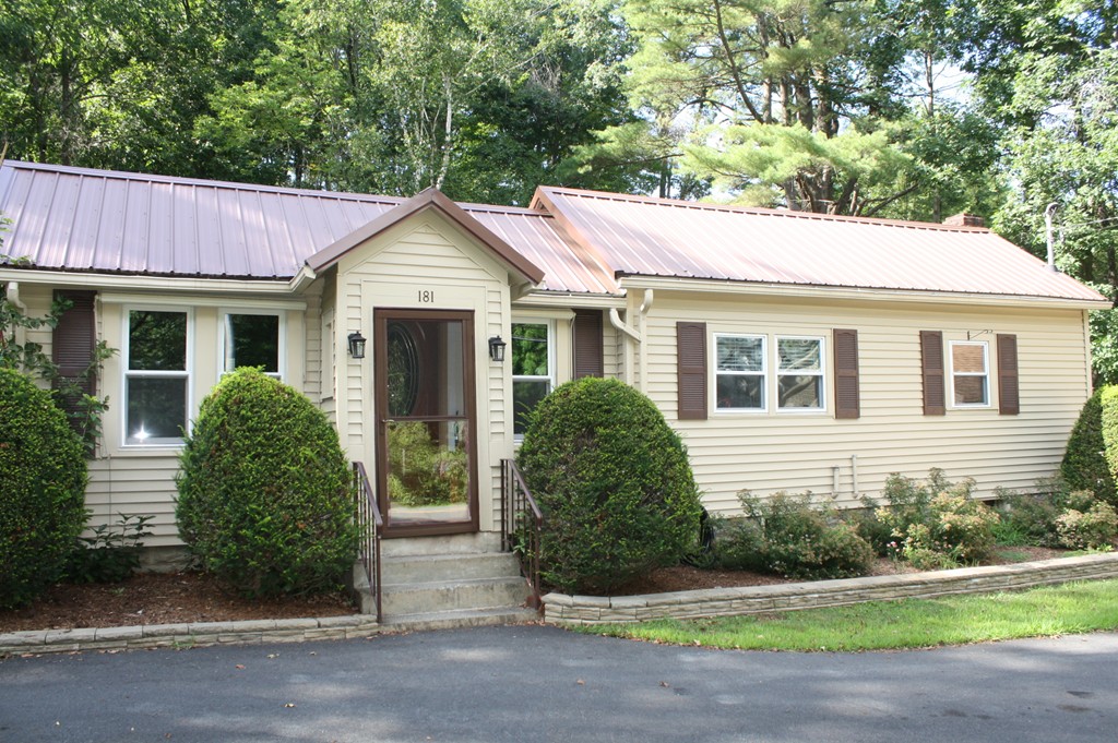 181 Main Road Gill, MA 01354 - Photo 1 of 13 a view of a house with a yard plants and large tree