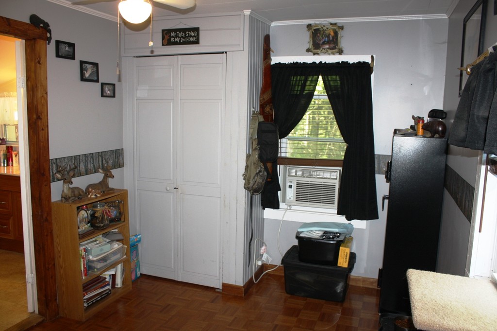 181 Main Road Gill, MA 01354 - Photo 12 of 13 a living room with furniture and a window