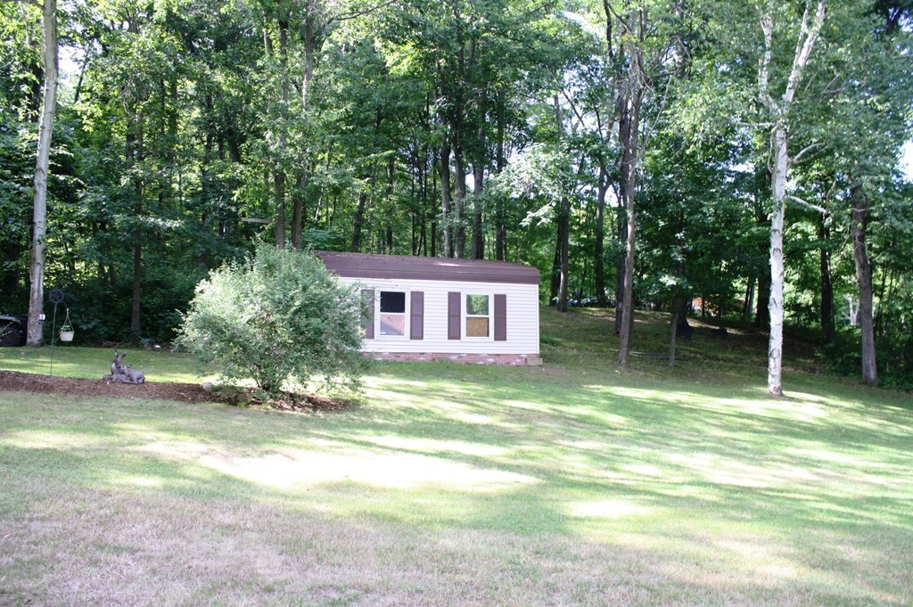 181 Main Road Gill, MA 01354 - Photo 6 of 13 a view of a house with backyard