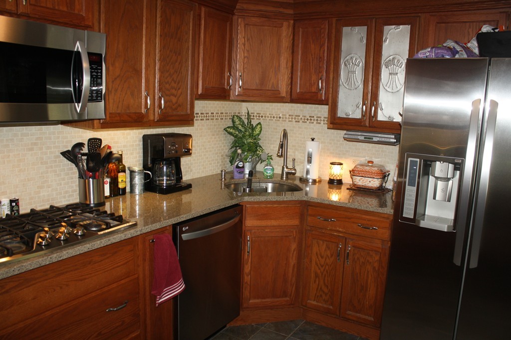 181 Main Road Gill, MA 01354 - Photo 8 of 13 a kitchen with stainless steel appliances granite countertop a refrigerator stove and sink