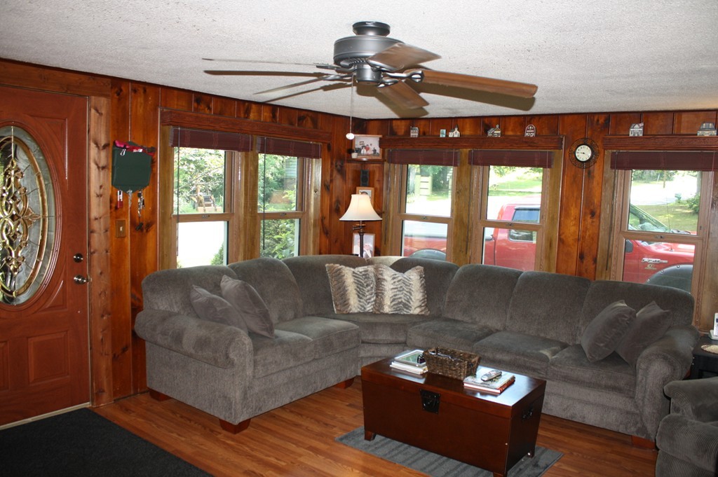 181 Main Road Gill, MA 01354 - Photo 9 of 13 a living room with furniture and a large window