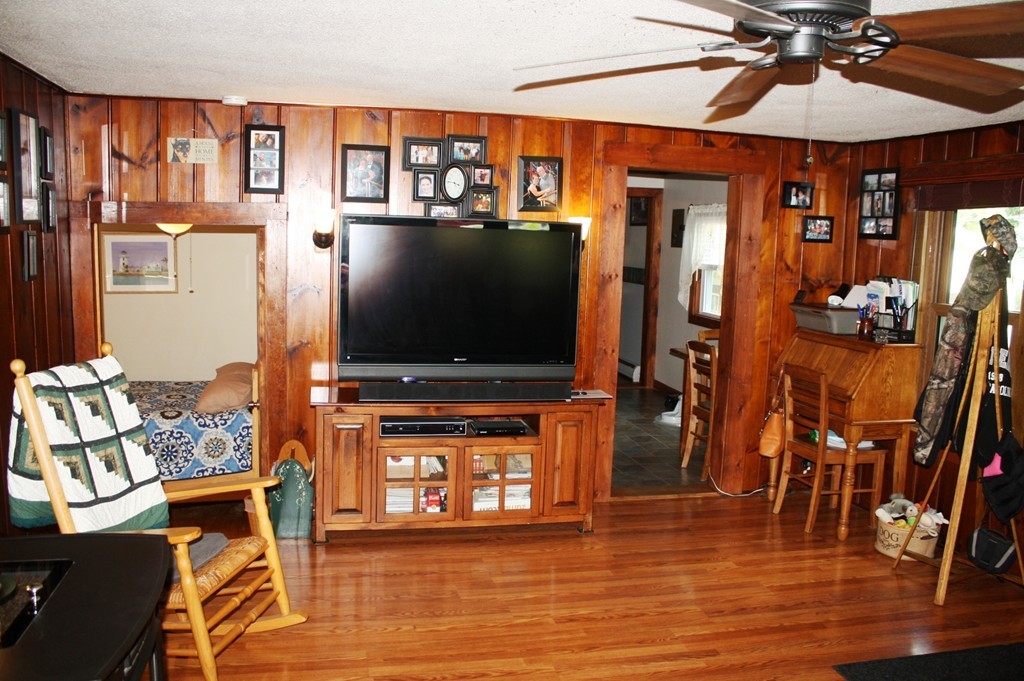 181 Main Road Gill, MA 01354 - Photo 10 of 13 a living room with furniture and a flat screen tv