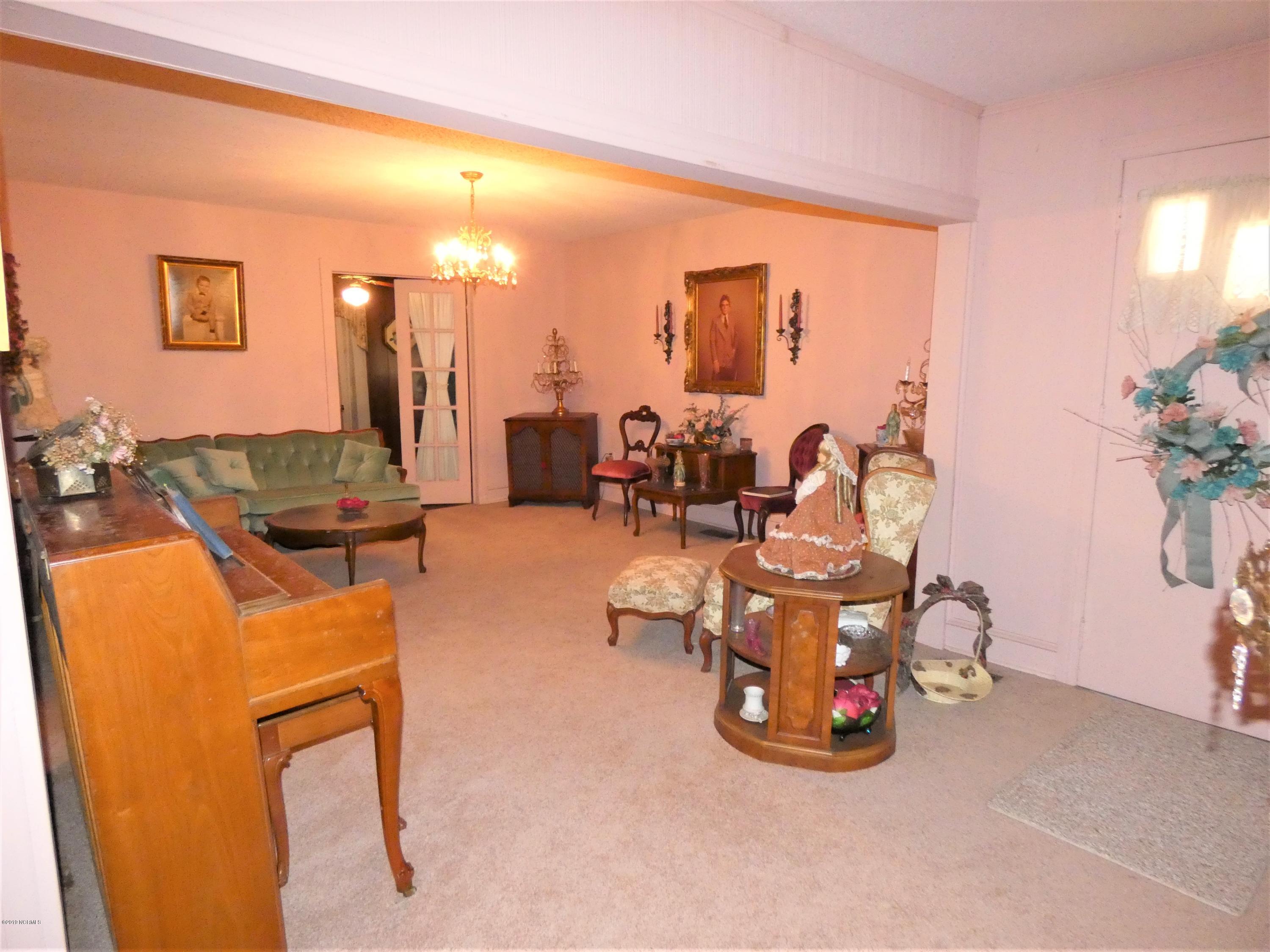392 High House Road Clinton, NC 28328 - Photo 6 of 16 From Foyer looking into Living Room. Front door on right.