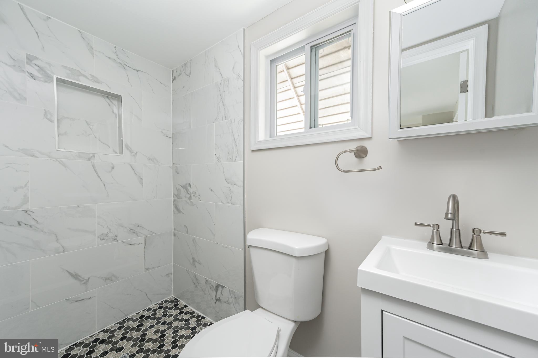7923 Eastdale Road Baltimore, MD 21224 - Photo 25 of 27 Bathroom with Large Walk in Shower