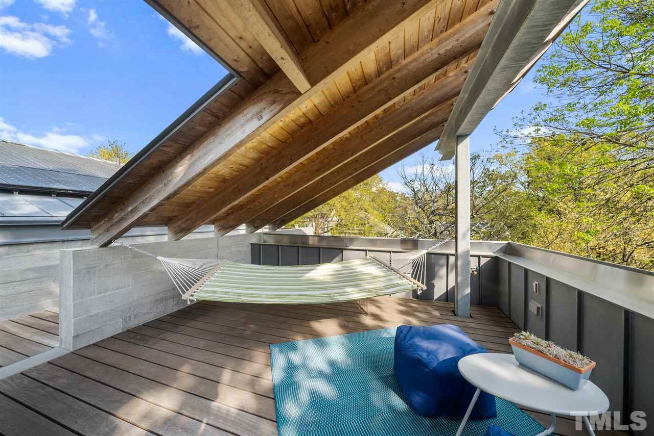 123 Hillcrest Road Raleigh, NC 27605 - Photo 23 of 30 located on the front portion of the house, great place to lounge and listen to the rain on the zinc roof