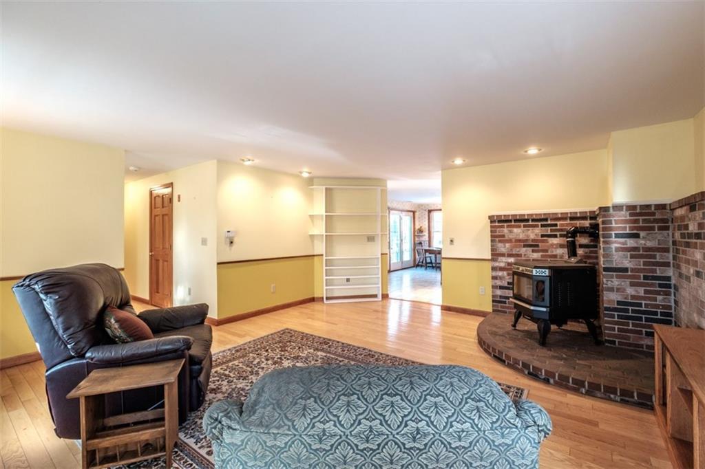 467 Walker Road Lyman, ME 04002 - Photo 5 of 34 The living room connects directly to...