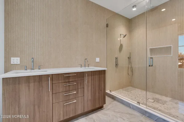 a view of an empty room with a fireplace