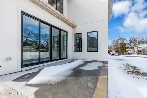 a view of a hallway with closet and entryway
