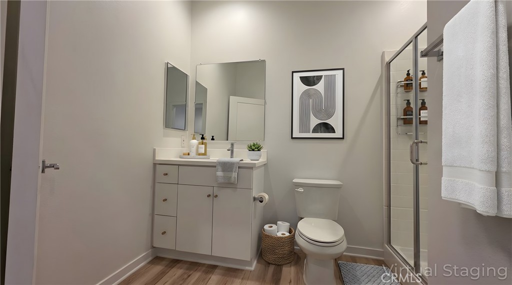 436 Village Brea Ca Brea, CA 92821 - Photo 19 of 30 a bathroom with a toilet sink and mirror