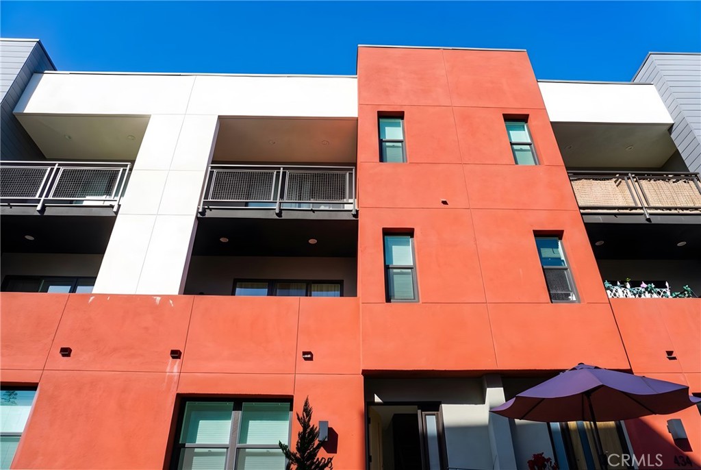 436 Village Brea Ca Brea, CA 92821 - Photo 22 of 30 a view of living room with furniture and a flat screen tv