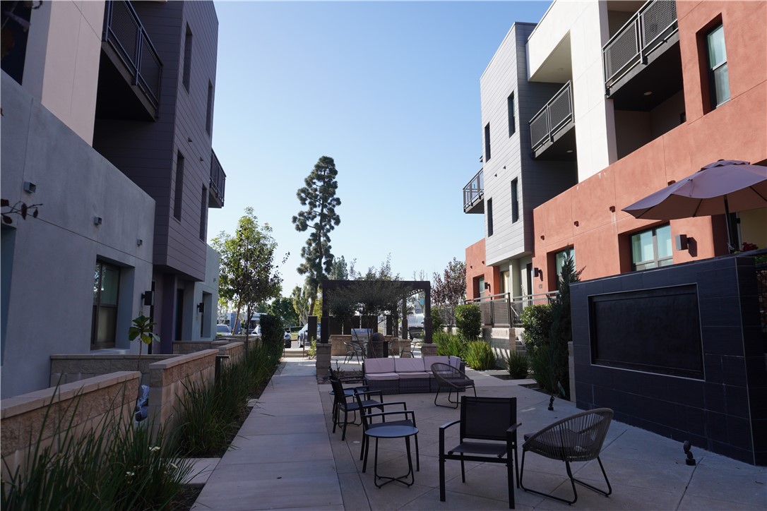 436 Village Brea Ca Brea, CA 92821 - Photo 23 of 30 a view of a patio with table and chairs