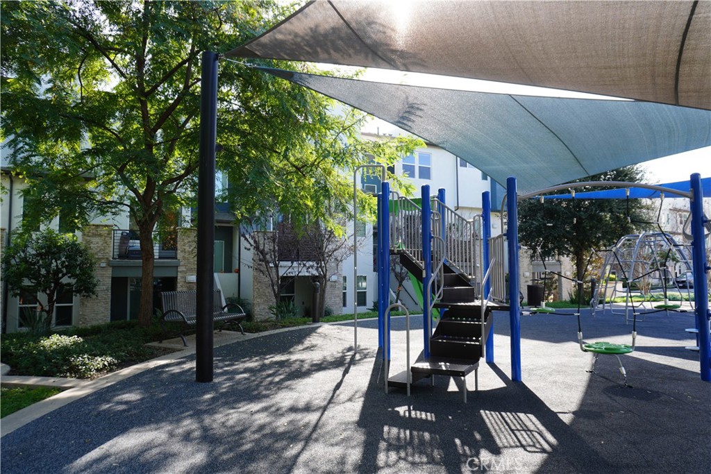 436 Village Brea Ca Brea, CA 92821 - Photo 28 of 30 a view of a patio with table and chairs a barbeque with wooden fence