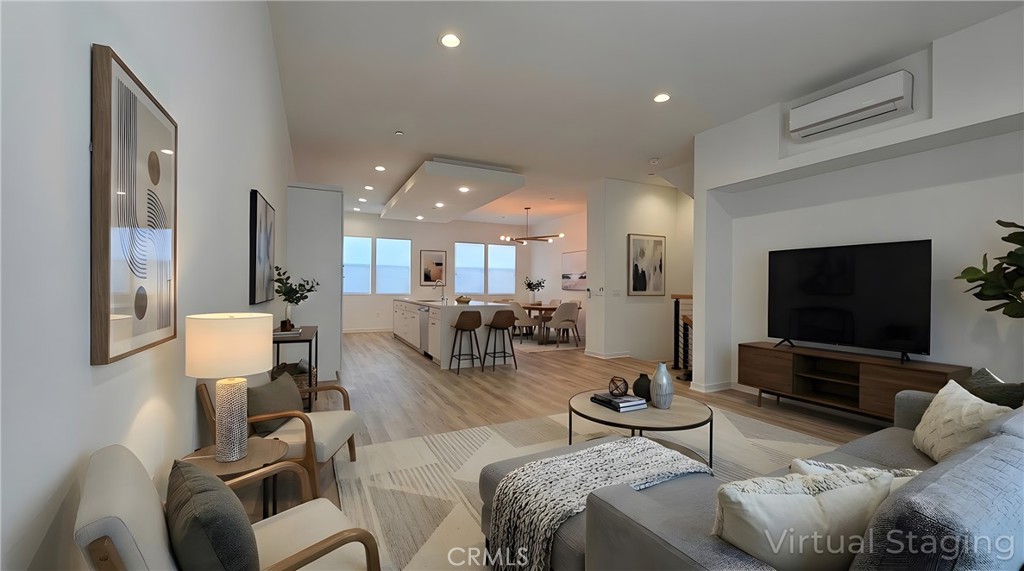 436 Village Brea Ca Brea, CA 92821 - Photo 3 of 30 a living room with furniture and a flat screen tv