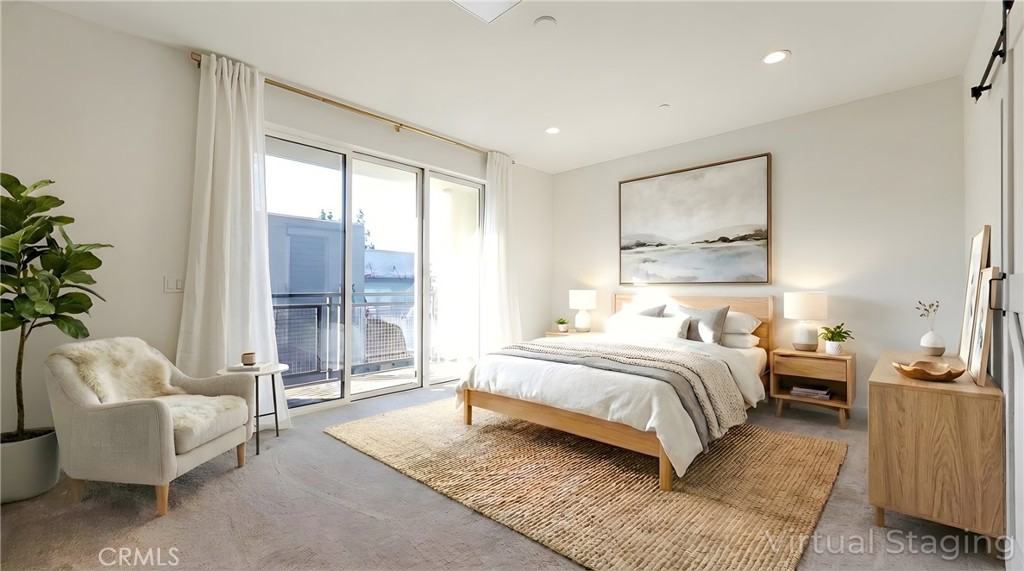 436 Village Brea Ca Brea, CA 92821 - Photo 5 of 30 a spacious bedroom with a bed and a couch