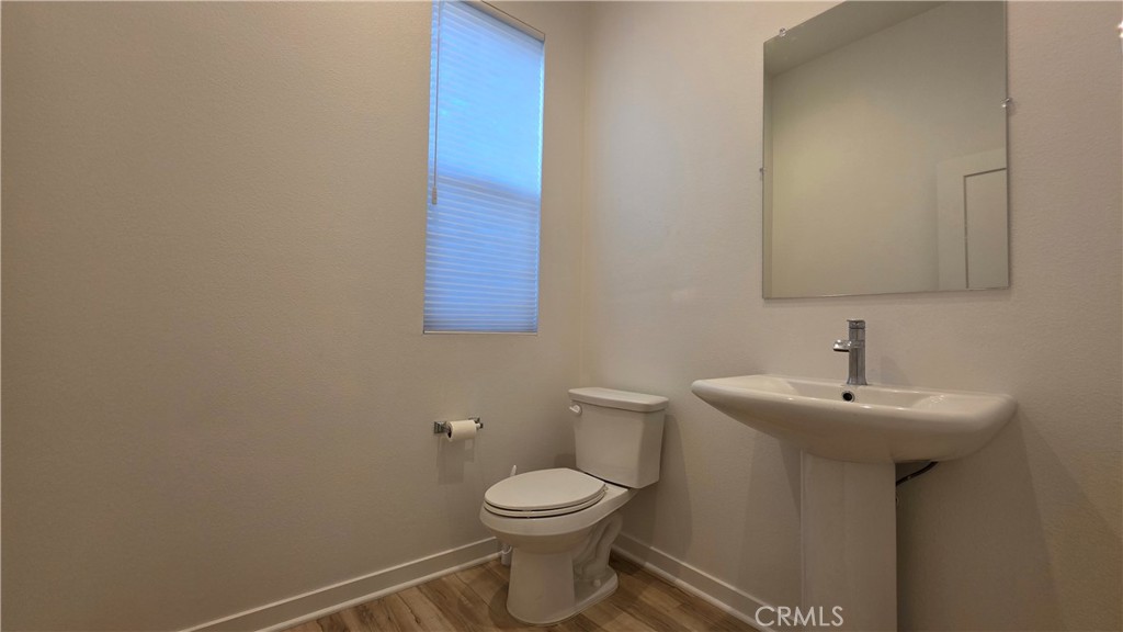 436 Village Brea Ca Brea, CA 92821 - Photo 8 of 30 a bathroom with a toilet sink and mirror