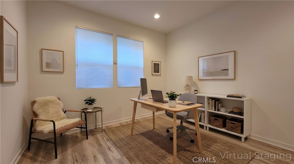 436 Village Brea Ca Brea, CA 92821 - Photo 9 of 30 a view of a workspace with furniture and wooden floor