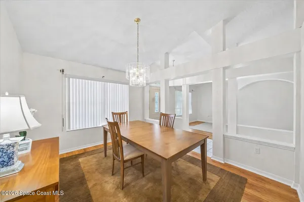 a view of a dining room with furniture
