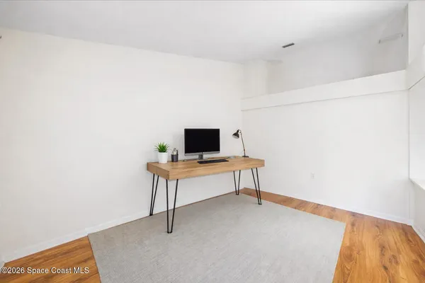 a room with a table and chairs