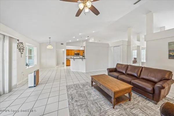 a living room with furniture and a rug