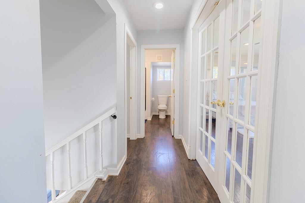 7583 Tyler Road Verona, PA 15147 - Photo 20 of 50 a view of a hallway with a wooden floor