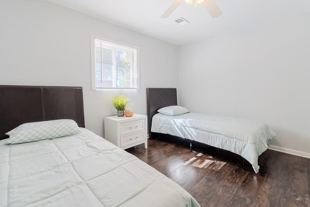 7583 Tyler Road Verona, PA 15147 - Photo 27 of 50 a bedroom with a bed and window