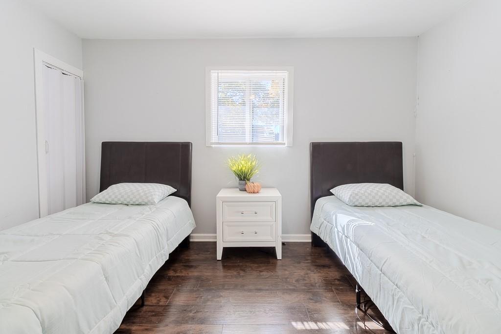 7583 Tyler Road Verona, PA 15147 - Photo 28 of 50 a bedroom with a bed and window
