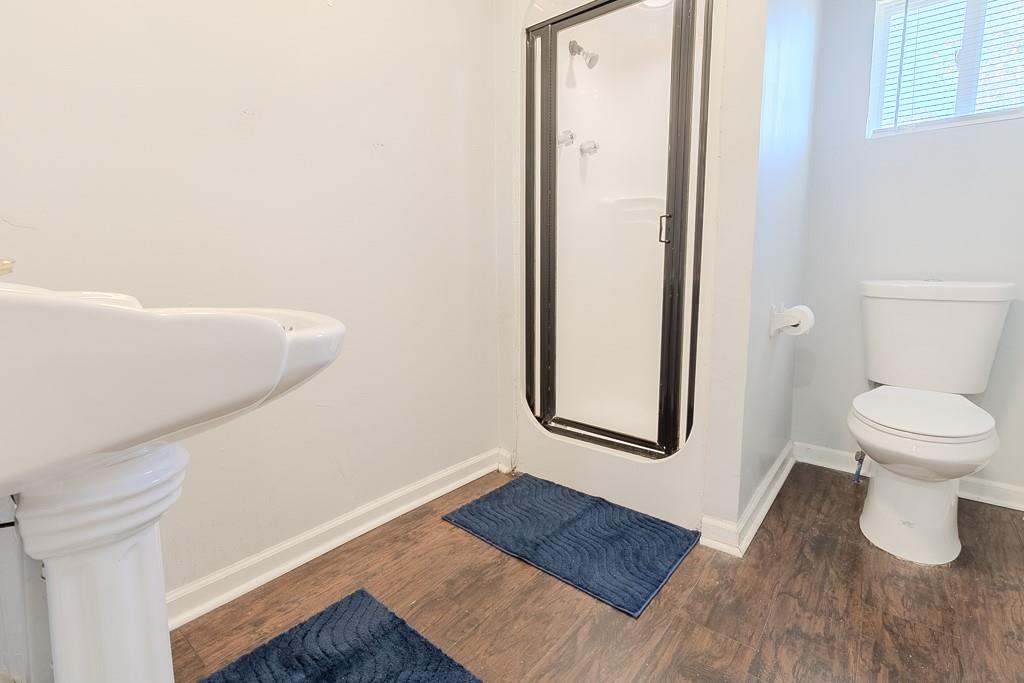 7583 Tyler Road Verona, PA 15147 - Photo 30 of 50 a bathroom with a toilet and a shower