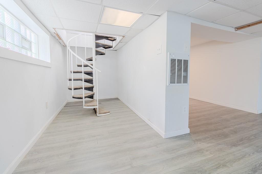 7583 Tyler Road Verona, PA 15147 - Photo 36 of 50 a view of entryway and hall with wooden floor