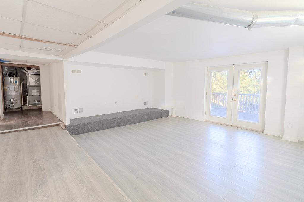 7583 Tyler Road Verona, PA 15147 - Photo 39 of 50 wooden floor in an empty room with a window