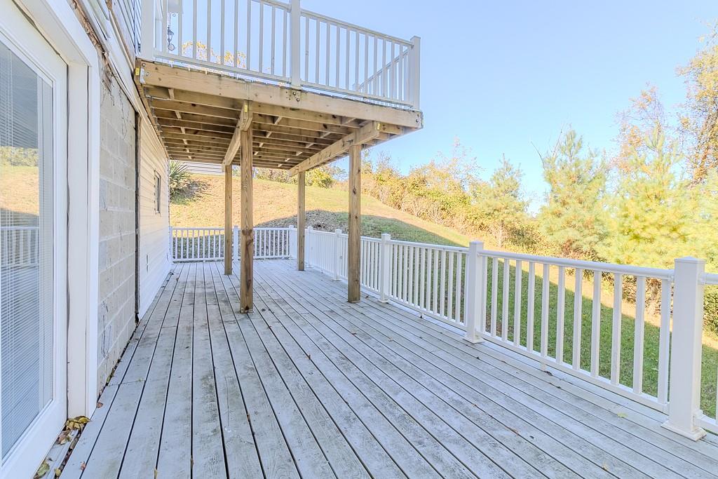 7583 Tyler Road Verona, PA 15147 - Photo 41 of 50 a view of a wooden deck with a yard