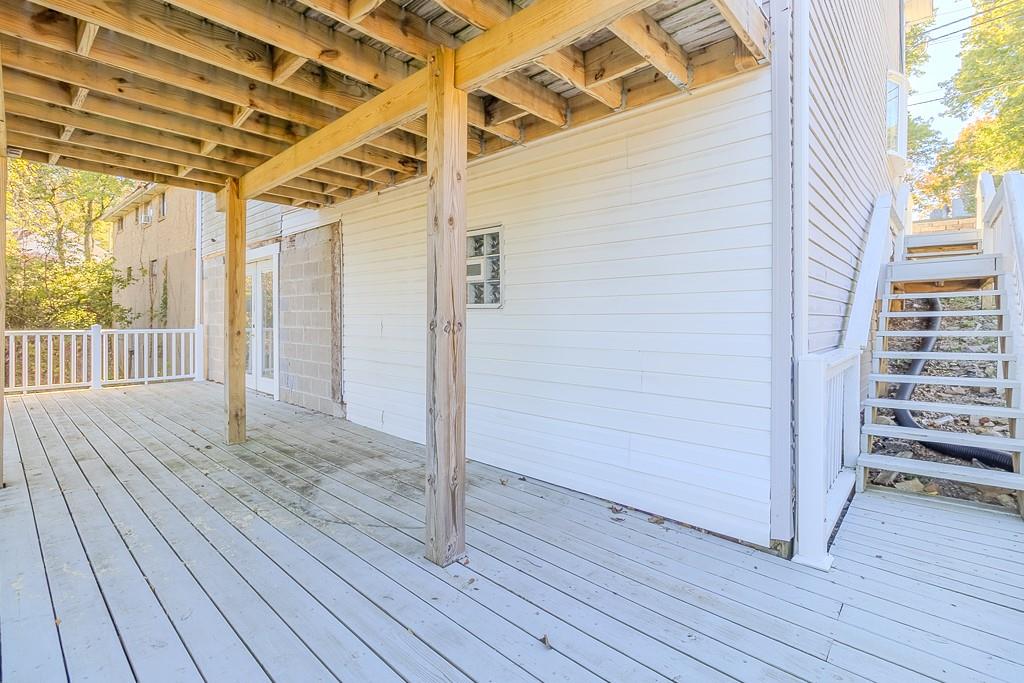 7583 Tyler Road Verona, PA 15147 - Photo 42 of 50 a view of an empty room with wooden floor and fence
