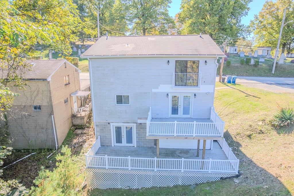 7583 Tyler Road Verona, PA 15147 - Photo 45 of 50 a view of a house with a yard