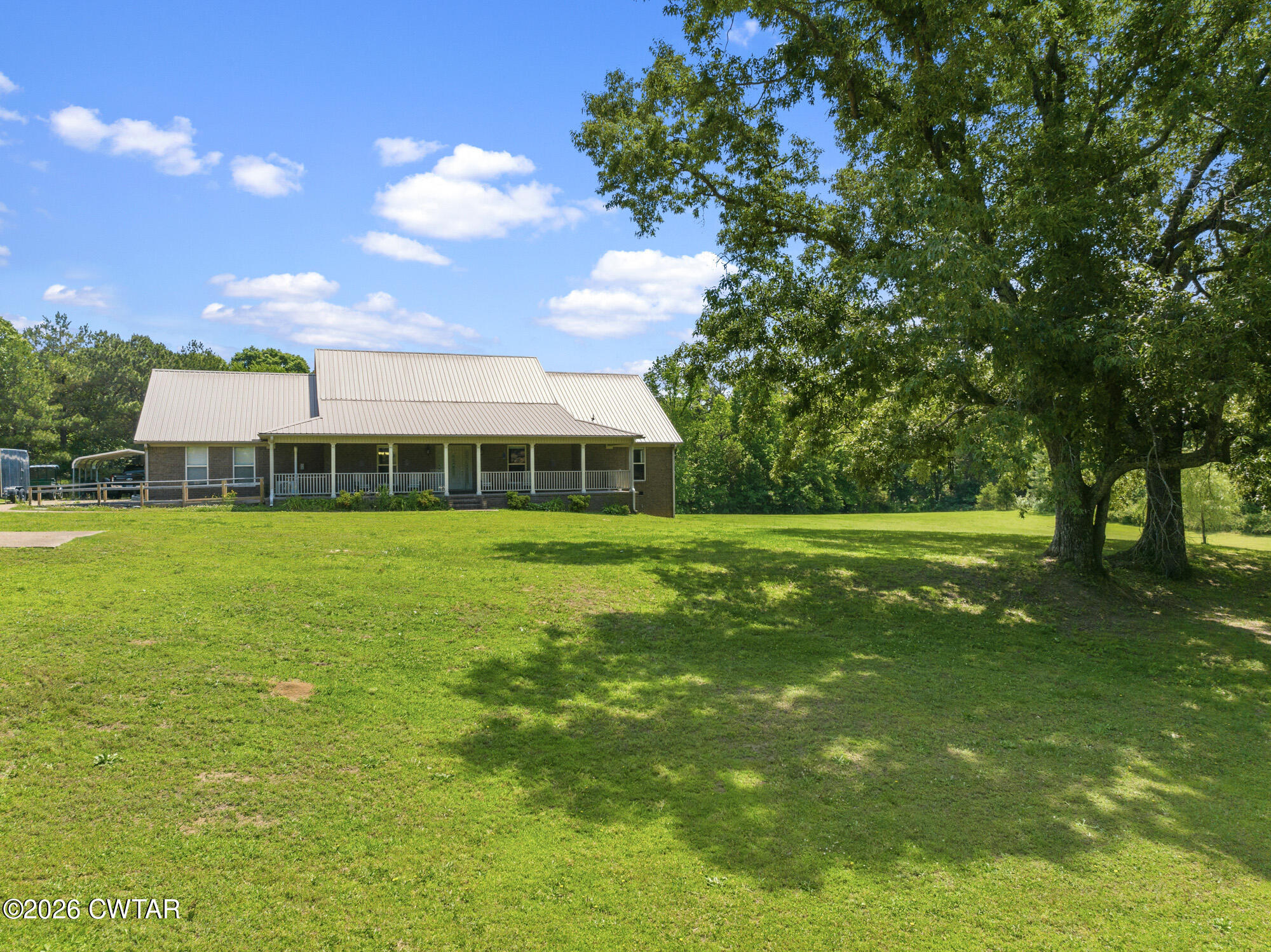 492 Joe Horton Road Lexington, TN 38351 - Photo 41 of 49 a view of a house with a big yard