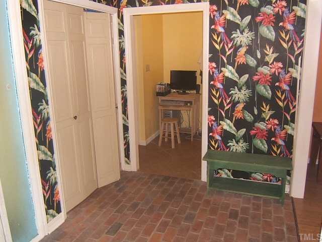 1226 Lorimer Road Raleigh, NC 27606 - Photo 11 of 12 Large entry with brick floor!
