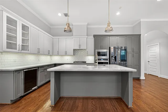 a view of entryway with wooden floor and stairs
