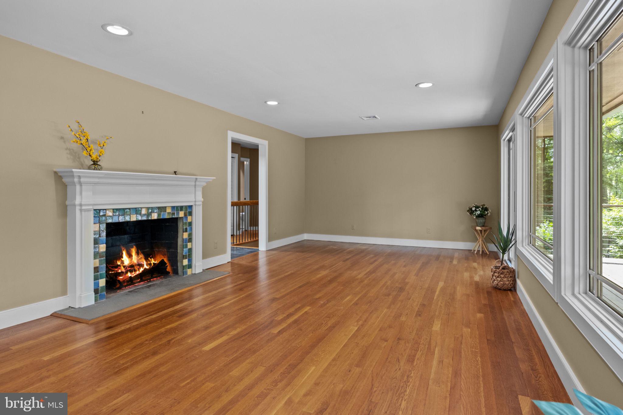 6975 Upper York Road New Hope, PA 18938 - Photo 11 of 61 Cozy fireplace with Mercer tile