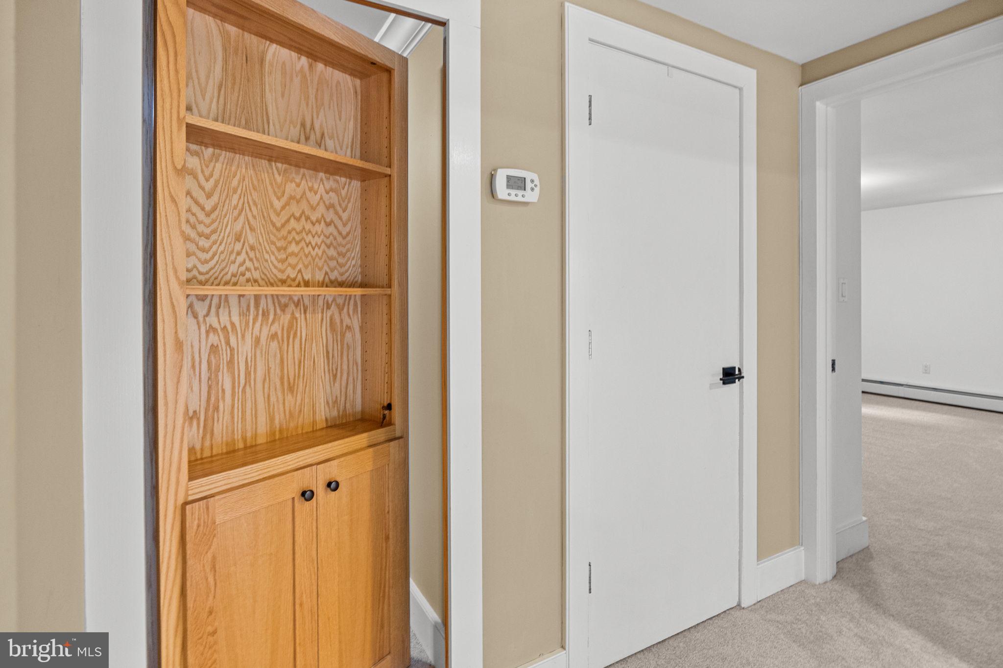 6975 Upper York Road New Hope, PA 18938 - Photo 36 of 61 Hidden flex space behind bookshelf