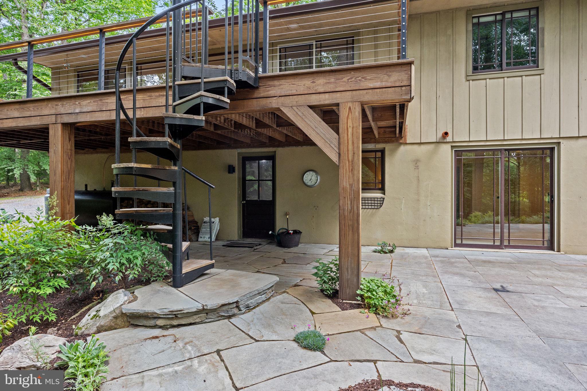 6975 Upper York Road New Hope, PA 18938 - Photo 42 of 61 Spiral staircase provides patio/pool access