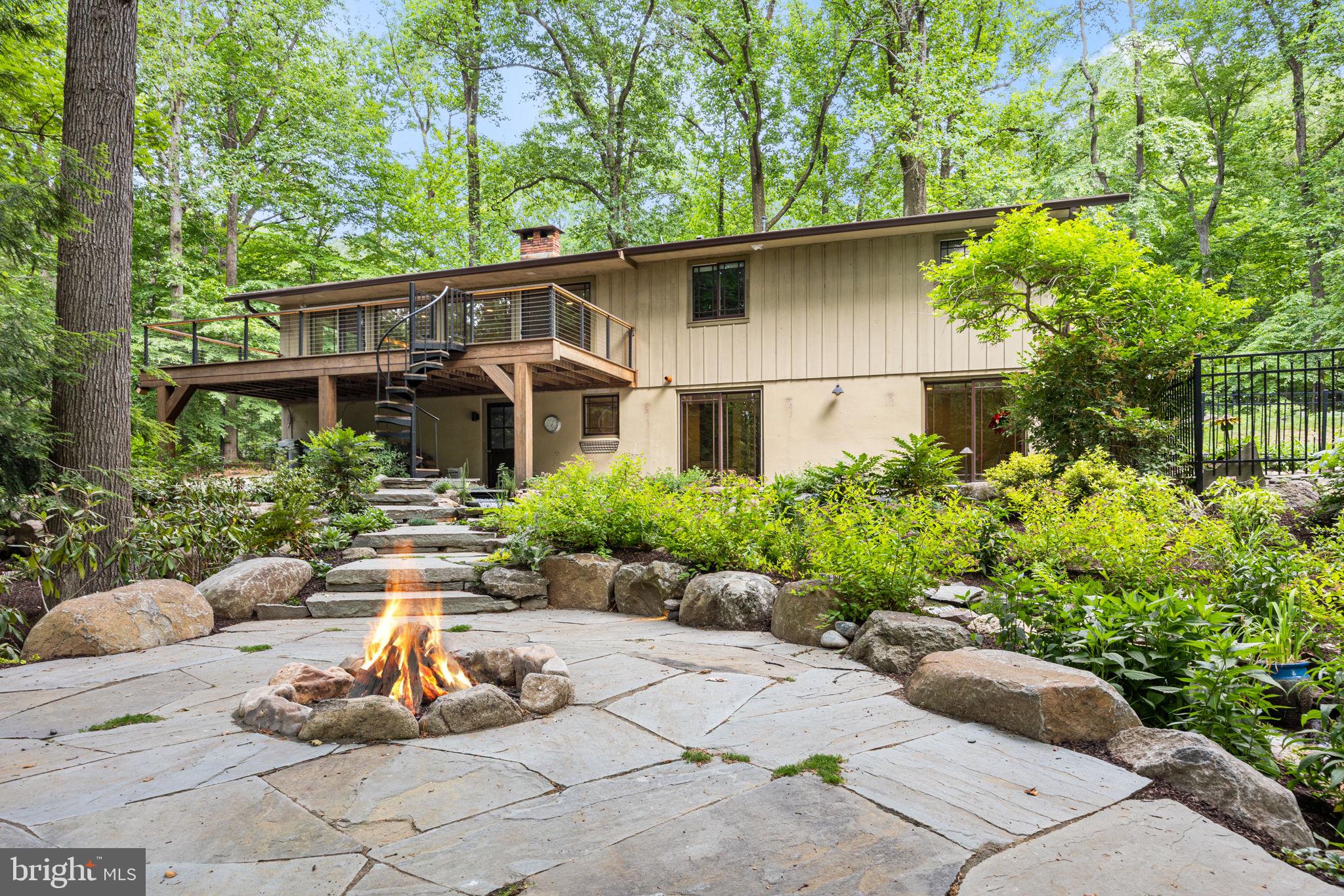 6975 Upper York Road New Hope, PA 18938 - Photo 49 of 61 Built-in firepit calls for cozy nights out back